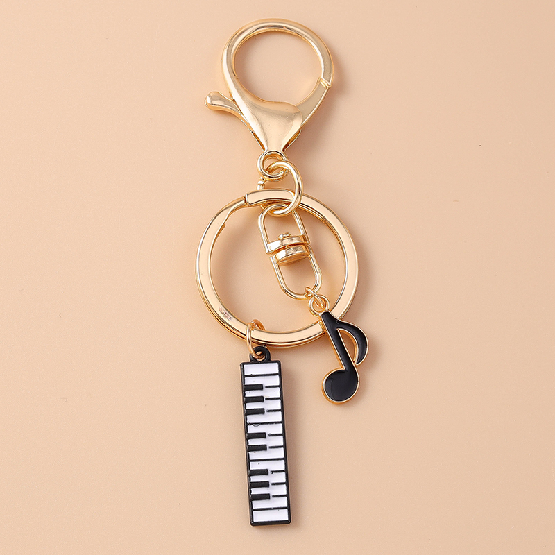 Cute Enamel Mini Piano Keychai - огляд і ціна Musical Instrument Tabla